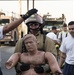 Firefighters with the U.S. Air Force and Qatar Emiri Air Force complete a firefighter combat challenge at Al Udeid Air Base