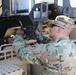 Army Reserve Soldier prepares vehicle for container transport