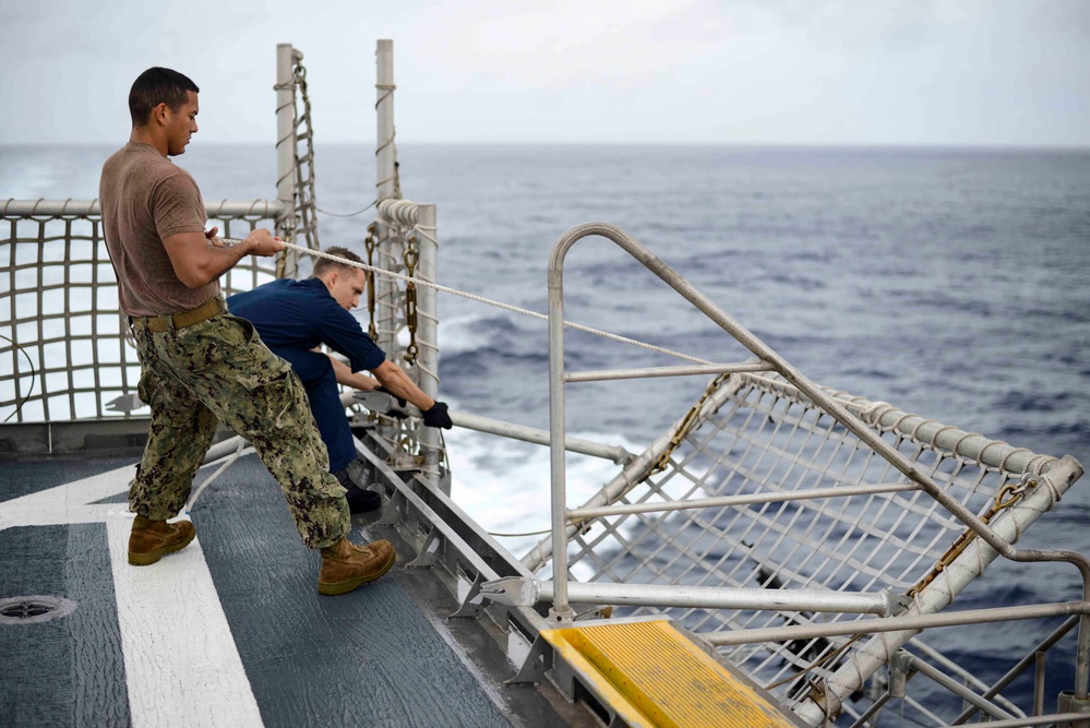 USNS Spearhead Assists in Search and Rescue for Crashed Plane Survivors