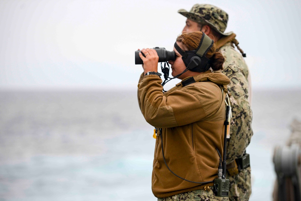 USNS Spearhead Assists in Search and Rescue for Crashed Plane Survivors