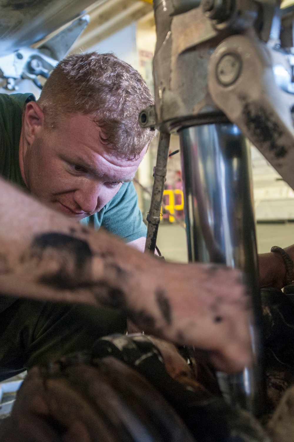 USS America Marine removes brake gear