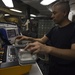 Sailor Checks Medical Equipment