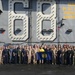 Naval Academy Graduates Pose For Photo Aboard Nimitz