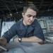 USS America Sailor plots ship’s course