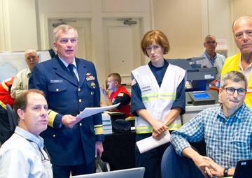 Coast Guard district commander receives operational brief from ESF 10 Florida