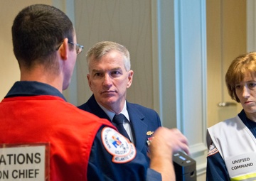 Coast Guard district commander receives operational brief from ESF 10 Florida
