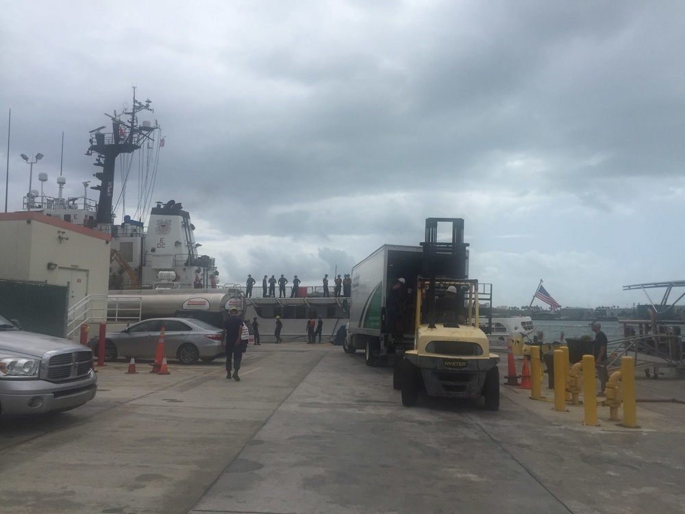 The Coast Guard Cutter Decisive loads relief supplies in aftermath of Hurricane Maria