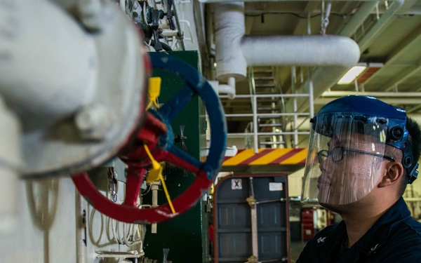 Sailor Conducts Maintenance