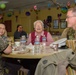 Sailors and Marines Participate in Tea with the Troops