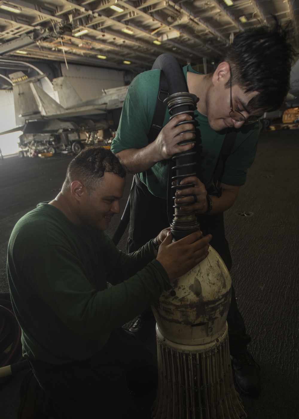 Sailors Perform Maintenance