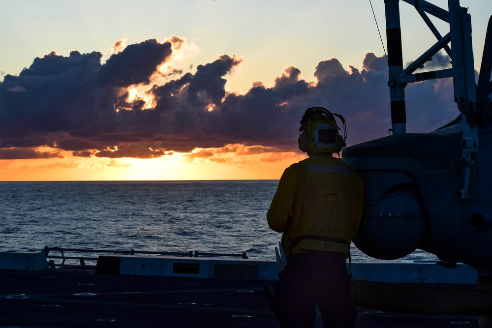 USS San Diego (LPD 22) Flight Deck Personnel Enjoys Sunset
