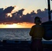 USS San Diego (LPD 22) Flight Deck Personnel Enjoys Sunset