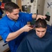 USS America Marine cuts hair