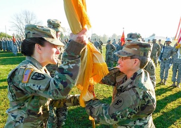 Col. Wood Relinquishes Command by passing the Colors During Her Change of Command Ceremony
