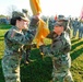 Col. Wood Relinquishes Command by passing the Colors During Her Change of Command Ceremony