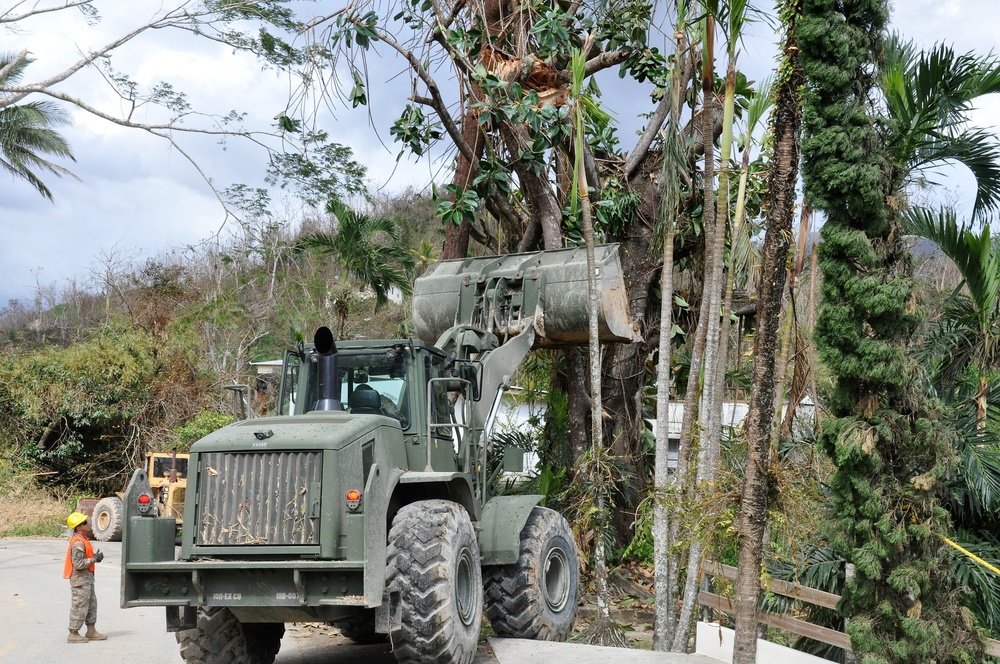 Road Clearing Mission in Utuado Puerto Rico, providing access to surrounding communities.