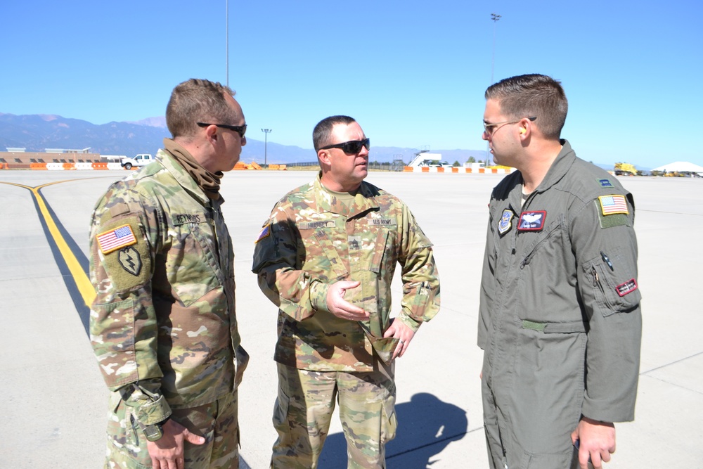 Colorado Army National Guard conduct C-130 airlift and HIMARS Hot-Pannel training.