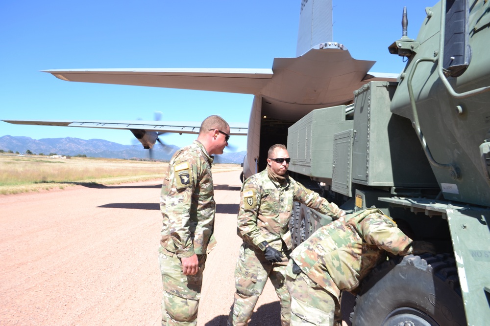 Colorado Army National Guard conduct C-130 airlift and HIMARS Hot-Pannel training.