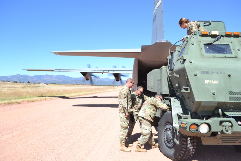 Colorado Army National Guard conduct C-130 airlift and HIMARS Hot-Pannel training.