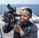 USS America Sailor plots course
