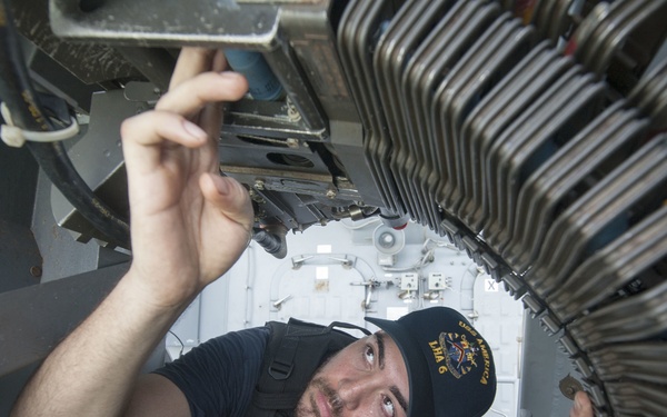 USS America Sailors load MK-38