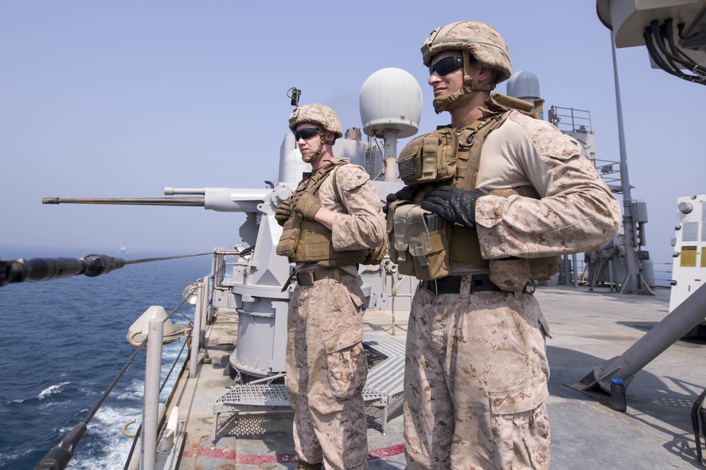 Pearl Harbor Sailors, 15th MEU Marines stand watch during strait transit