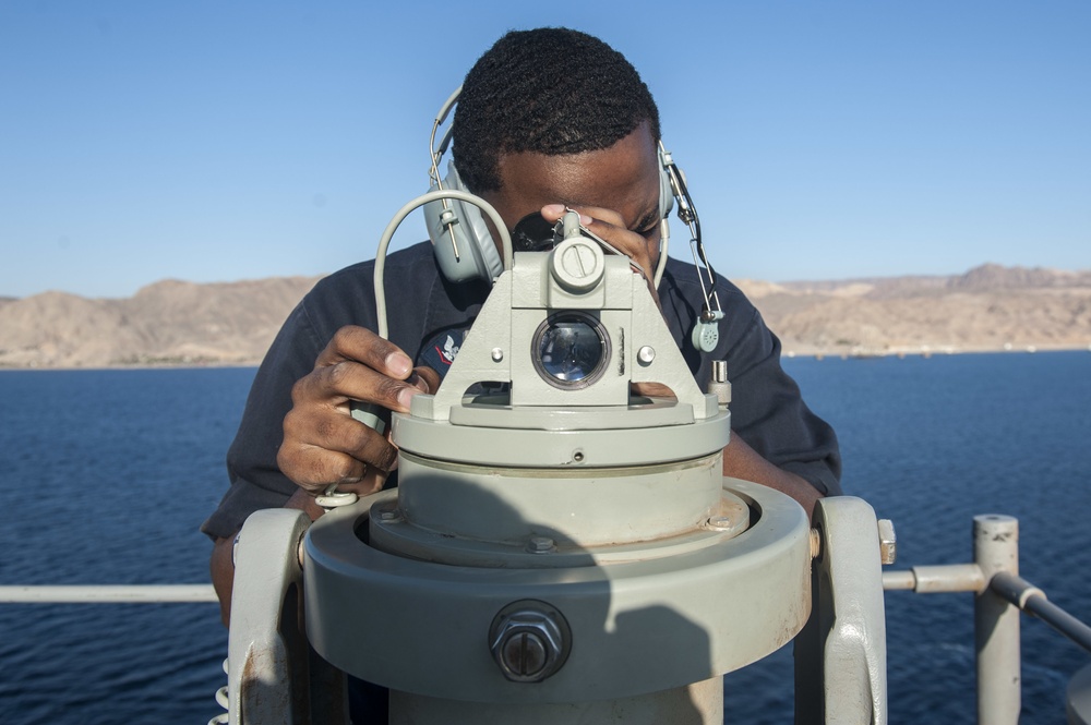 USS America Sailors measure ship’s bearing