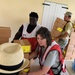 Red Cross Volunteers Help Hand Out Supplies to Local Residents