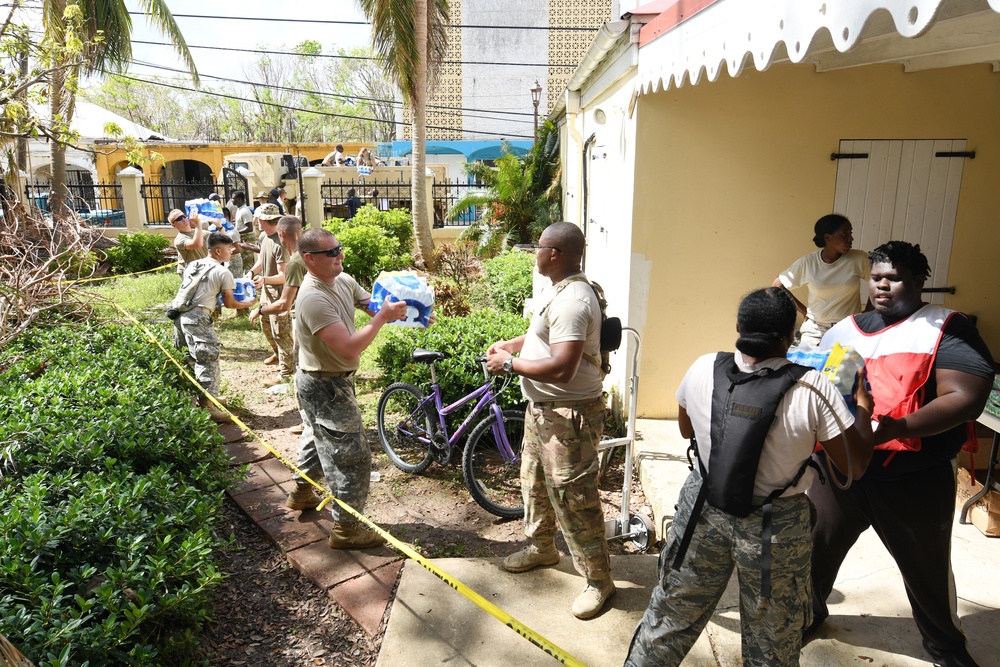 National Guardsmen Help to Restock a Point of Distribution