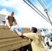 National Guardsmen Help to Restock a Point of Distribution