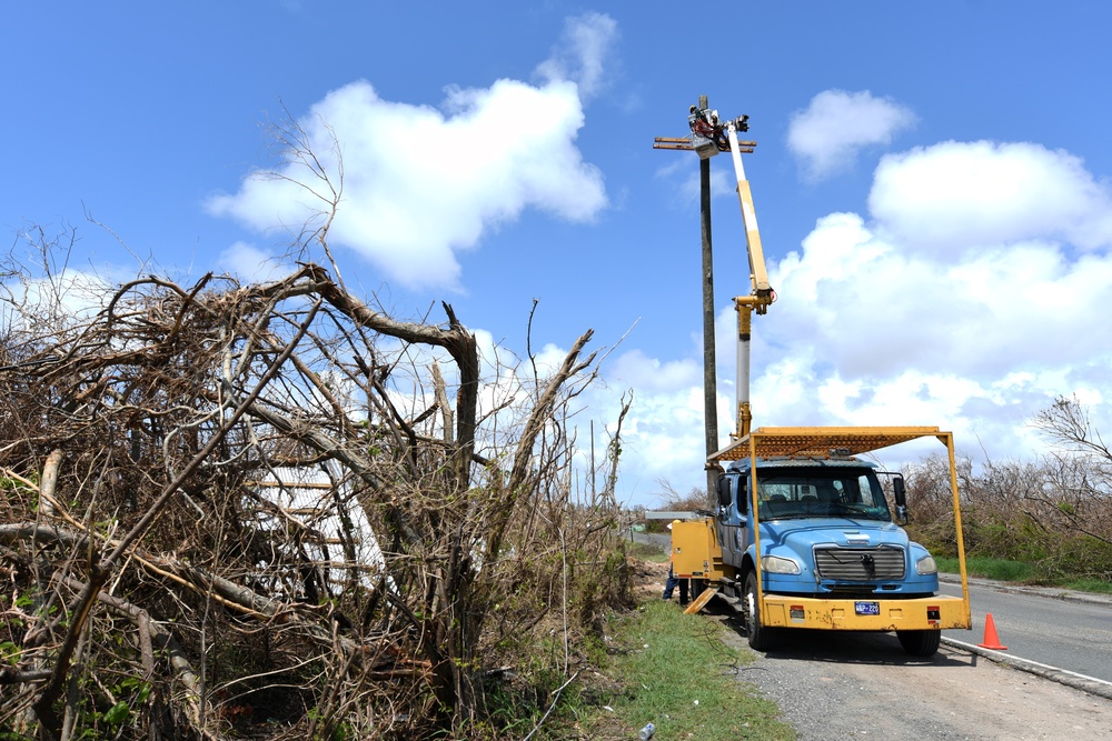 Teams Work to Repair Power Lines and Poles in St. Croix