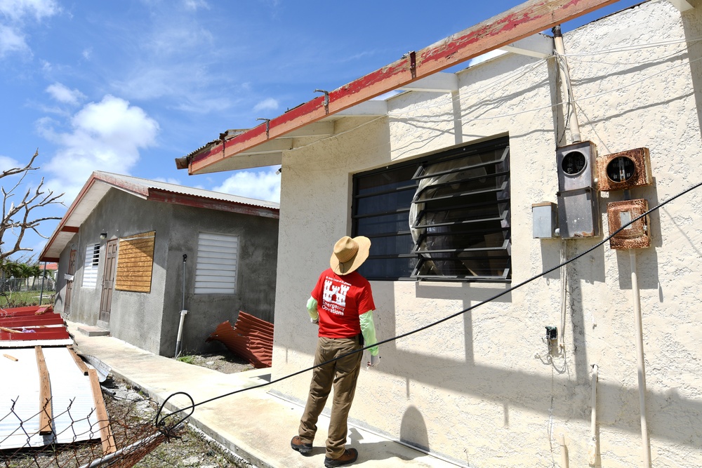 US Army Corps of Engineer  Inspectors Check Houses to See If They Are Available  For Operation Blue Roof