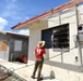 US Army Corps of Engineer  Inspectors Check Houses to See If They Are Available  For Operation Blue Roof