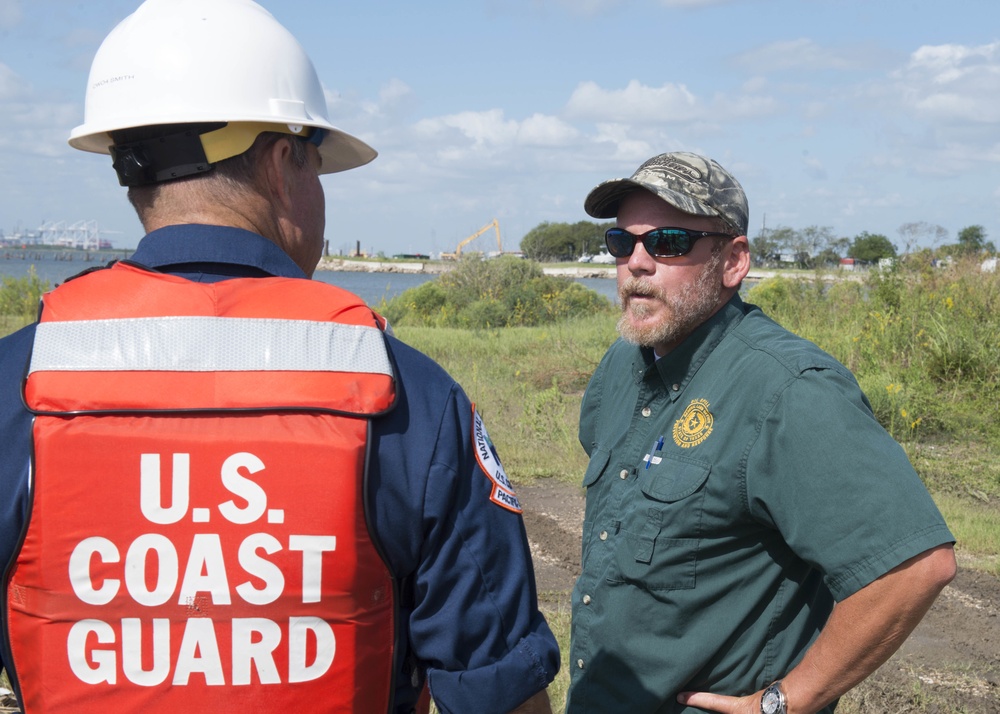 Cabin cruiser sunk by Hurricane Harvey refloated in Baytown, Texas