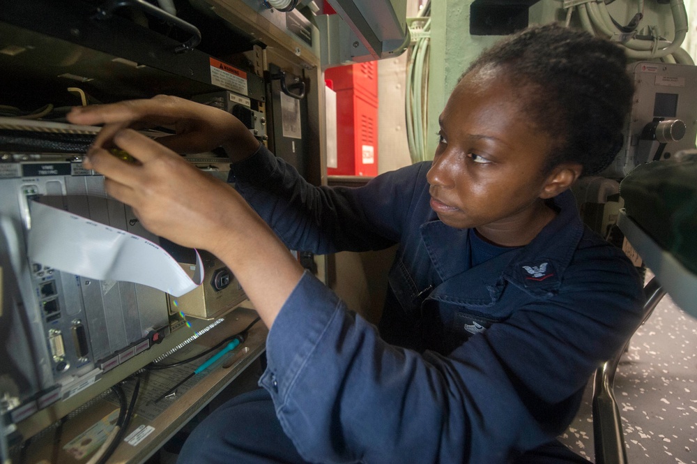 USS America Sailor replaces power supply