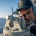 USS America Sailors measure ship’s bearing