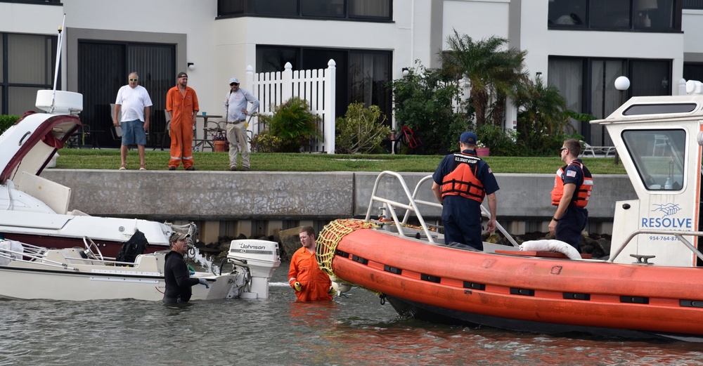 Coast Guard members oversee vessel removal operations in Pinellas County, Florida