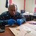 Hospital Corpsman Repairs Guatemalan Hospital Equipment during SPS 17