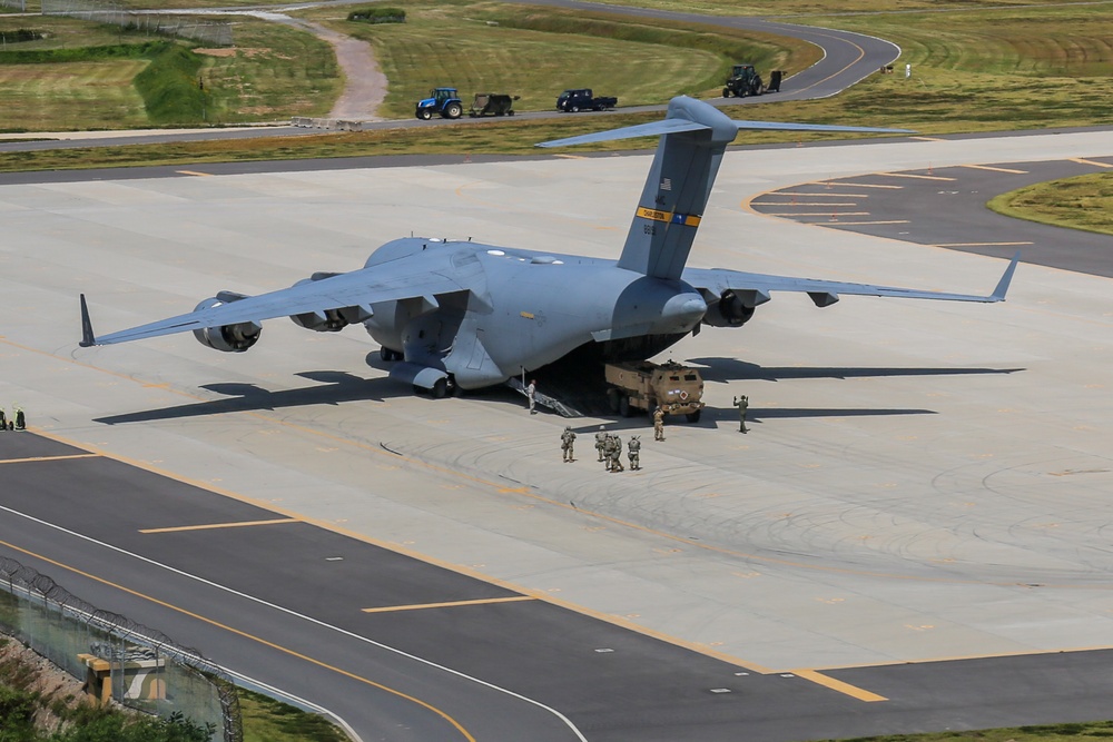 U.S. Military Lands C17 aircraft with two M142 High Mobility Artillery Rocket Systems aboard in South Korea