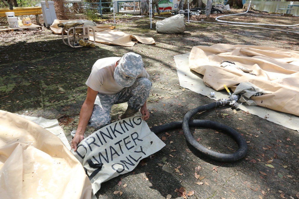 Puerto Rico Guardsmen purify lake water in Quebradillas Puerto Rico