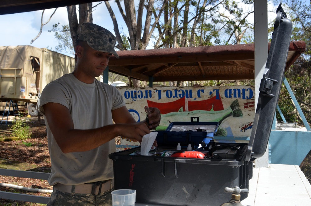 Soldiers purify water for residents near Lake Guajataca Puerto Rico