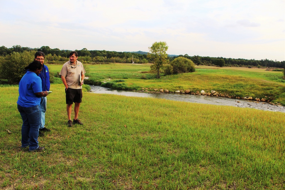 USFWS staff visits McCoy; observes progress of stream-habitat improvement