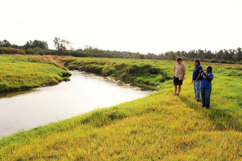 USFWS staff visits McCoy; observes progress of stream-habitat improvement