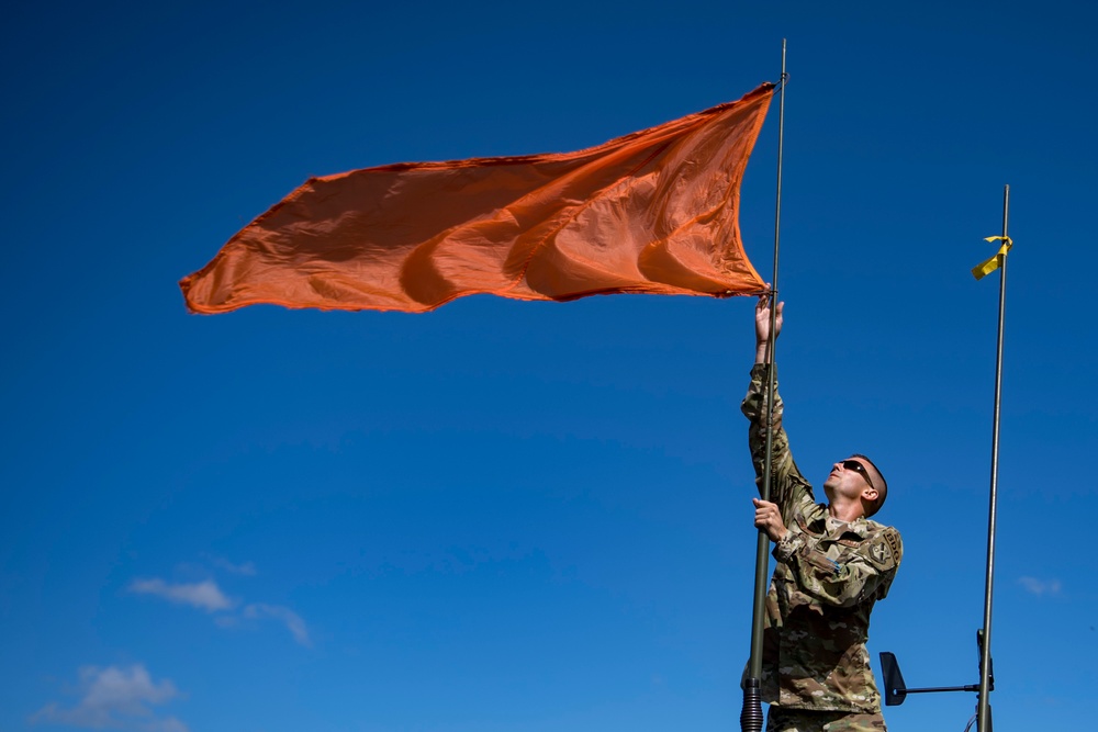 Airmen ‘rig’ parachute game