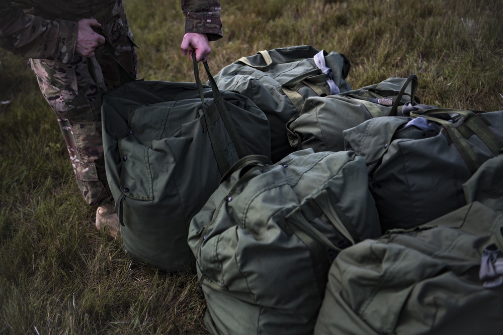 Airmen ‘rig’ parachute game