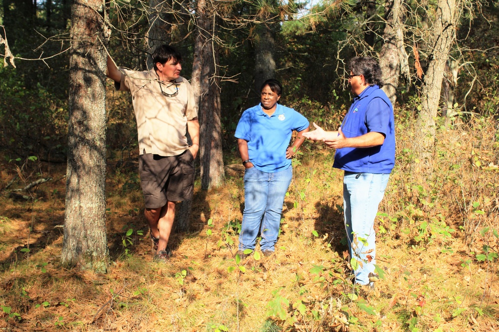 USFWS staff visits McCoy; observes progress of stream-habitat improvement