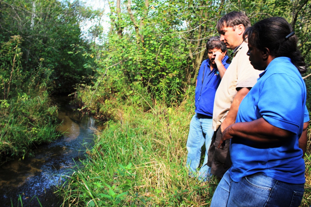 USFWS staff visits McCoy; observes progress of stream-habitat improvement