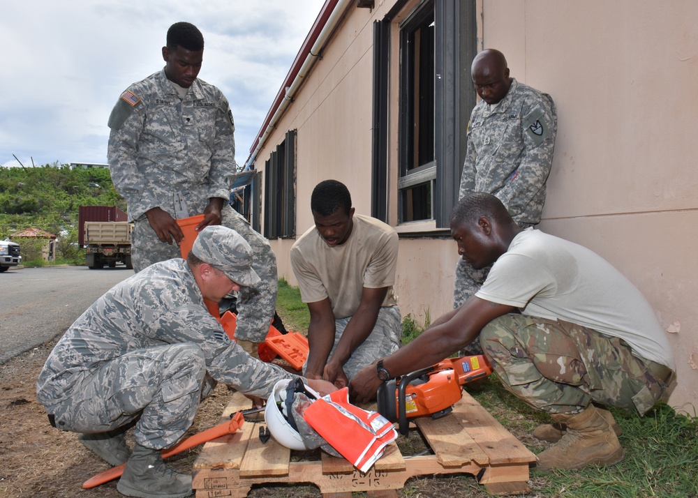 Task Force Bravo Guardsmen assist with debris clearance