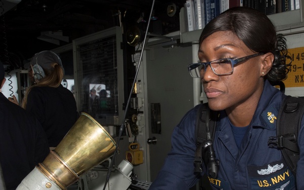 USS Lake Erie (CG 70) Chief Quartermaster stands watch