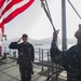America Sailor salutes flag